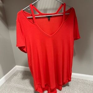 Reddish orange shirt
